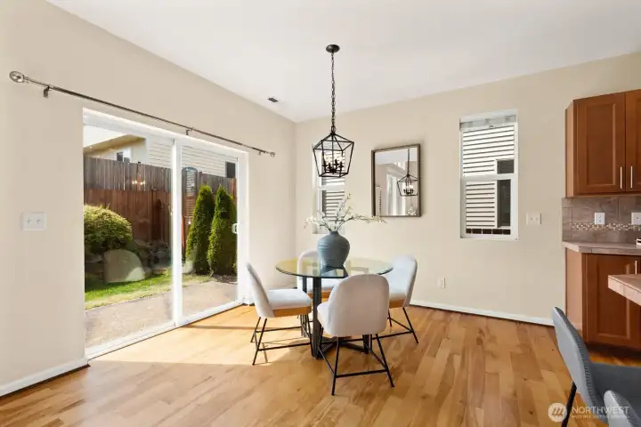 Designated dining area can accommodate large dining table.