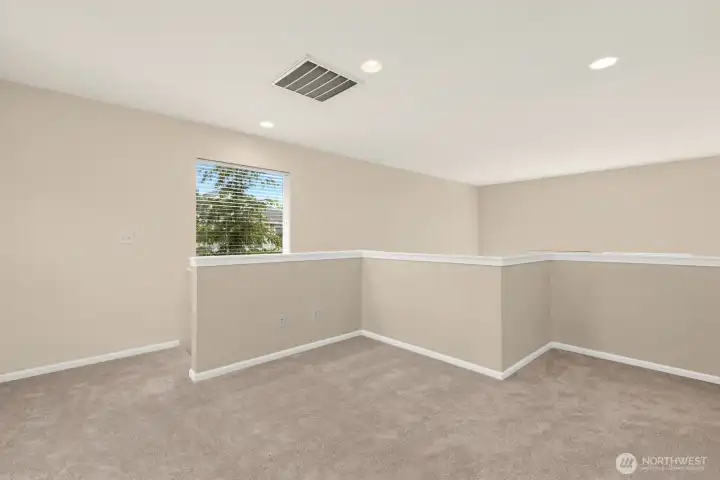 Versatile loft space on upper level