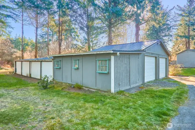 Garage has place for SIX vehicles + a mower