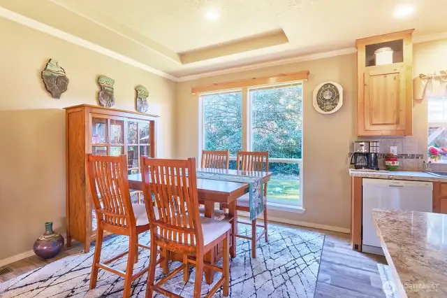 Dining area off ceiling with large west-facing window