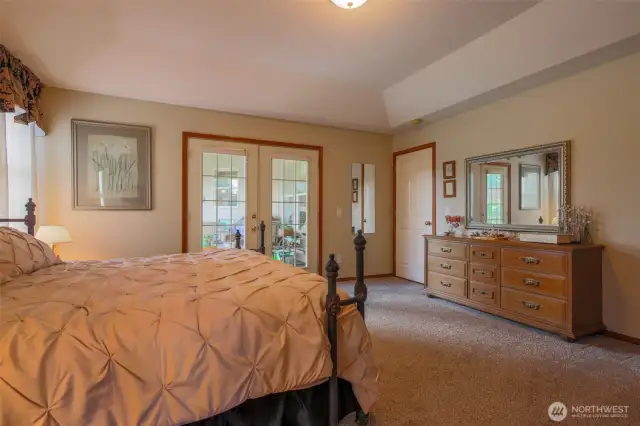 Primary Bedroom Has French Doors to Covered Back Patio