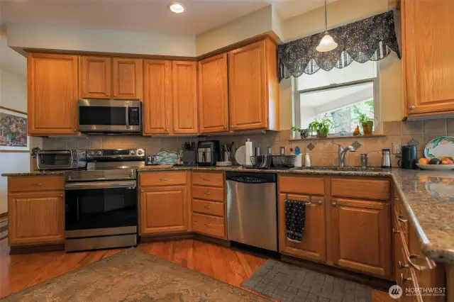 Stainless Steel Appliances. Granite Countertops.
