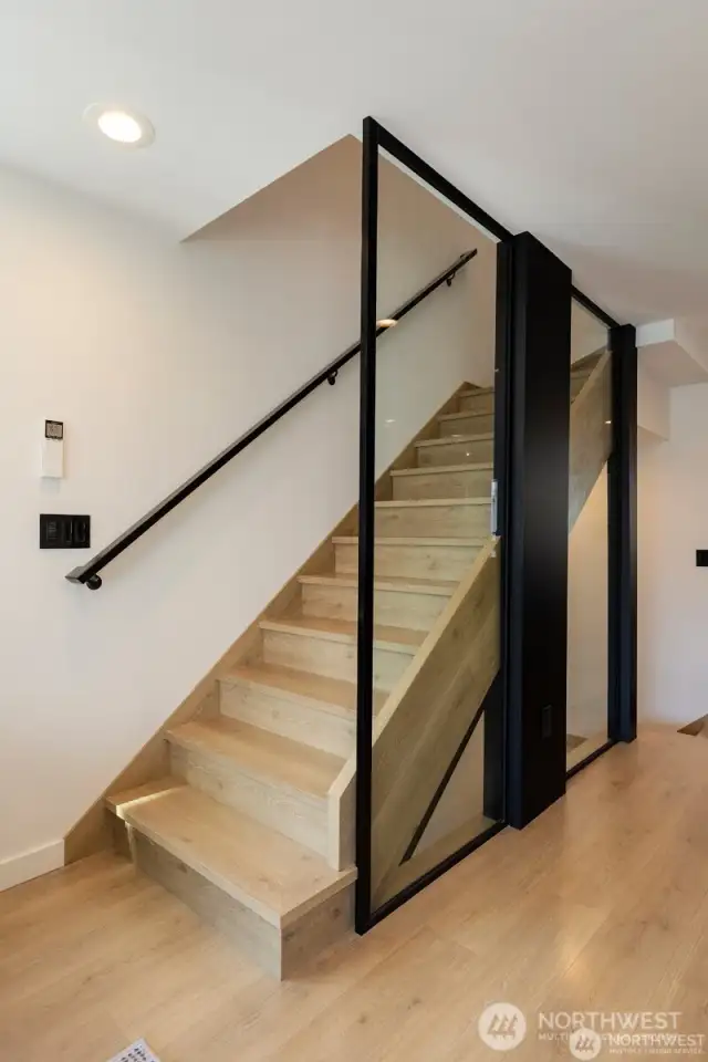 Stairs up to the top floor.
