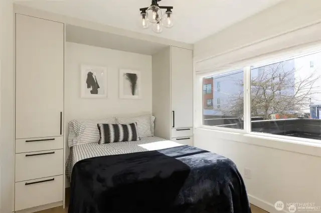Lower floor bedroom with built in closets.