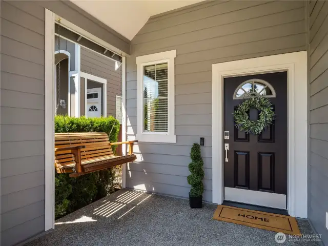 ...and inviting front porch, swing included!