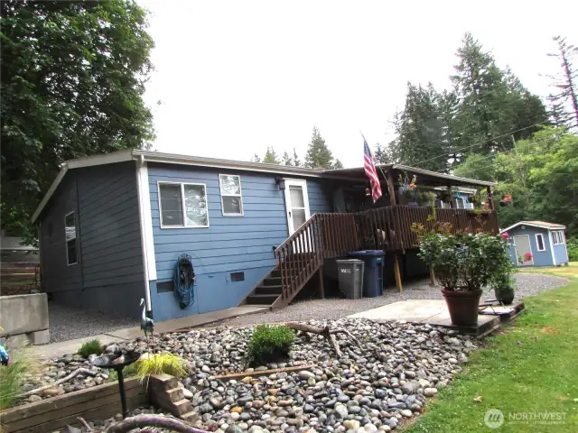 Rock Garden (Septic access lids area) adds character to peaceful setting.