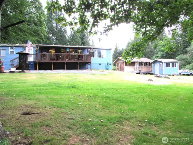 Acre plus sized lot and has separate road to access right of outbuilding area.