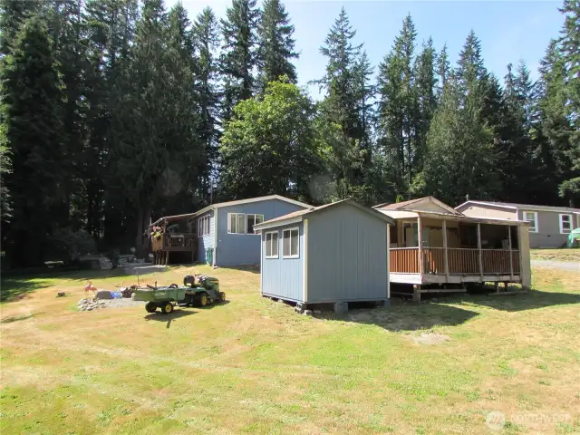 Acre plus sized lot and has separate road to access right of outbuildings area.