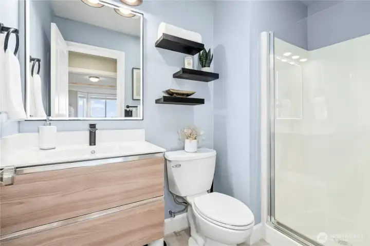 Main floor 3/4 bath next to the 2nd bedroom