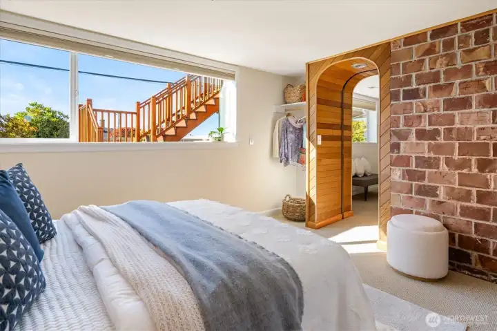 A fourth bedroom on the lower level also captures beautiful natural light.