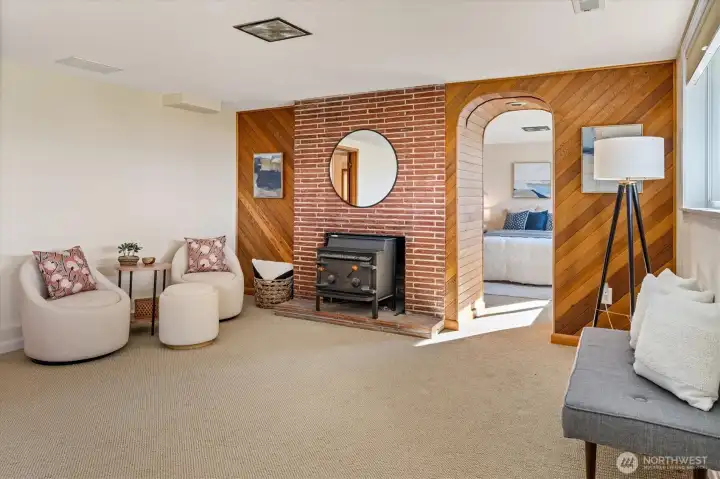 The feel downstairs with a stove insert and plenty of room is ideal for “game day” for your sports team.