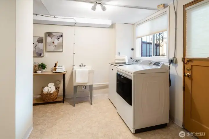 The lower level laundry room is spacious and well organized.