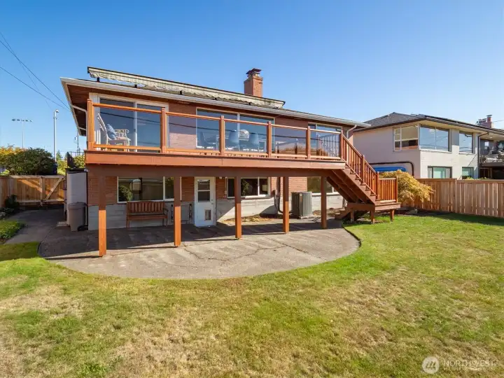 The patio under the deck creates another inviting outdoor area.