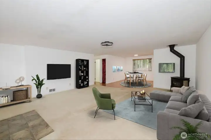 Virtually staged Living room open to dining