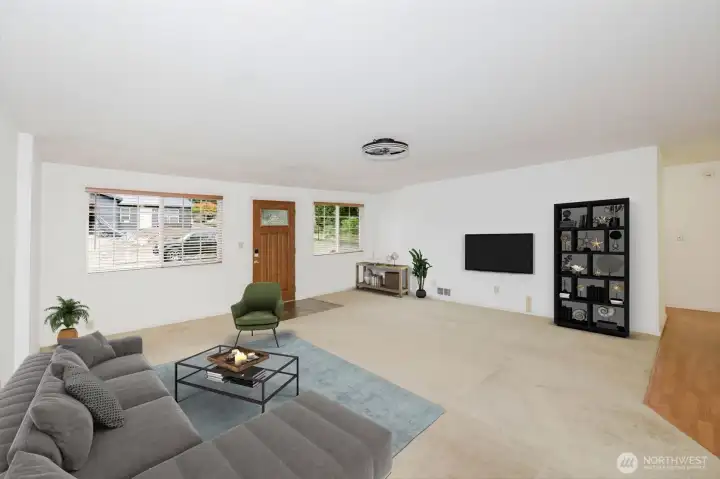 Virtually staged Living room open to dining