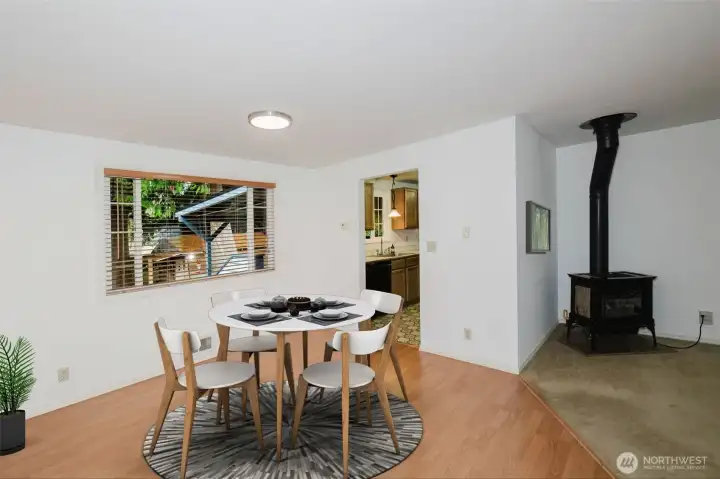 Virtually staged Dining room open to living room