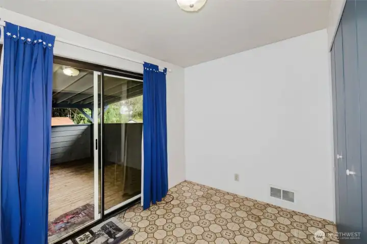 Dining space with access to laundtry.