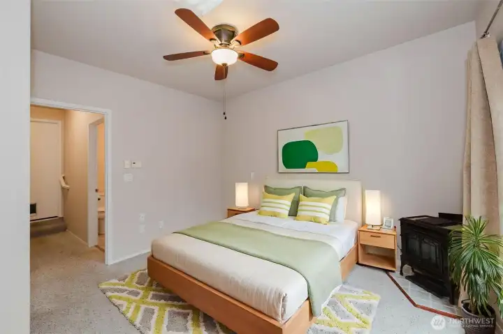 Virtually staged bedroom  off kitchen with .75 bath