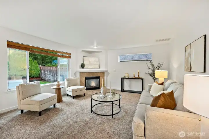 This family room is where it's at! Large space and cozy fireplace