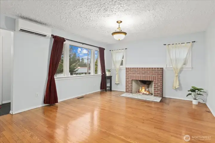 Large windows fill the room with natural light and  a mini-suite provides efficient year-round comfort.