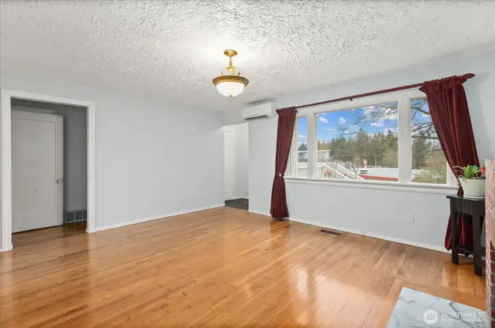 A doorway leads directly to the primary suite.