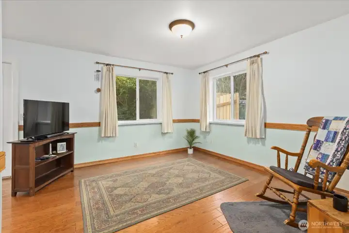 Open-concept layout connects seamlessly from the kitchen and dining room into the family room.