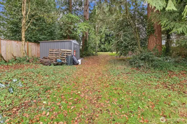 Generous .27 acre backyard with potential for future building (buyer verify).