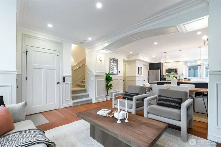 Spacious living and dining has high ceilings and great light.