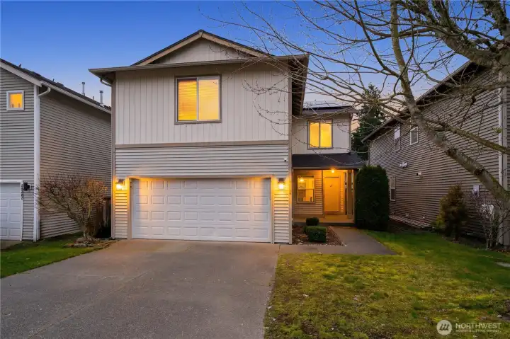 Front exterior with updated roof installed in 2024.