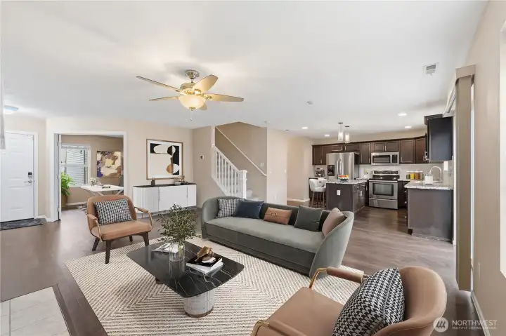 Open connection to kitchen and dining areas.