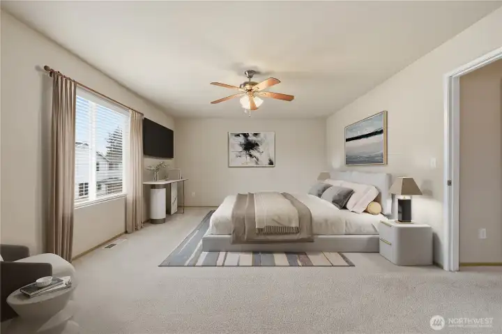 Spacious primary bedroom with comfortable proportions.