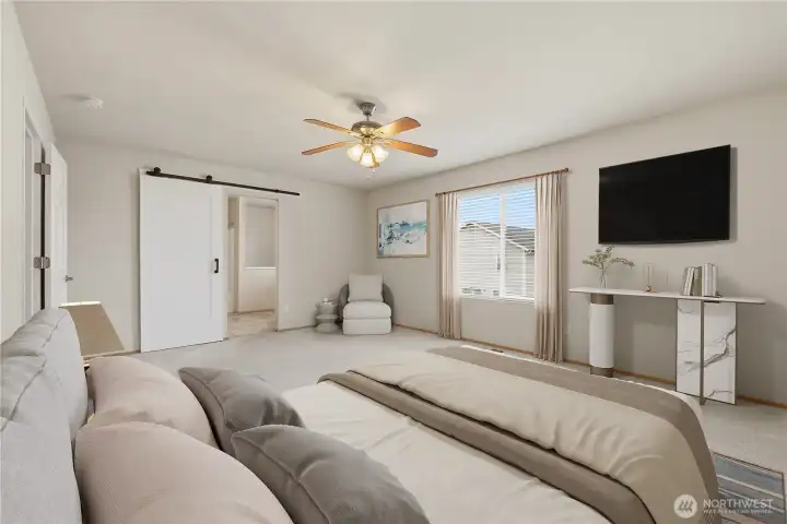 The primary bedroom is well-designed layout for privacy and comfort.