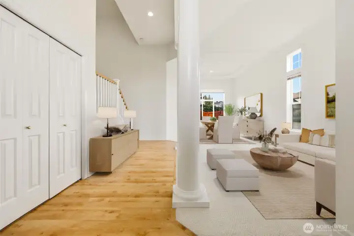 Bright and welcoming entry with soaring ceilings and beautiful natural light Bright and welcoming entry with soaring ceilings and beautiful natural light