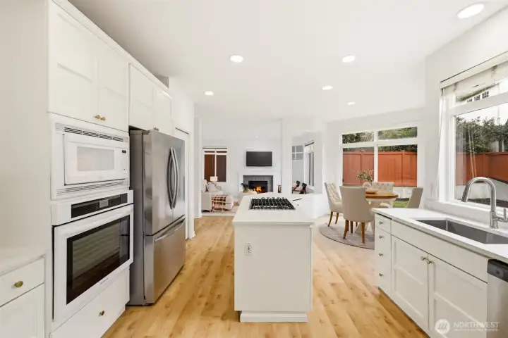 Bright kitchen featuring new quartz countertops and stainless appliances Bright kitchen featuring new quartz countertops and stainless appliances