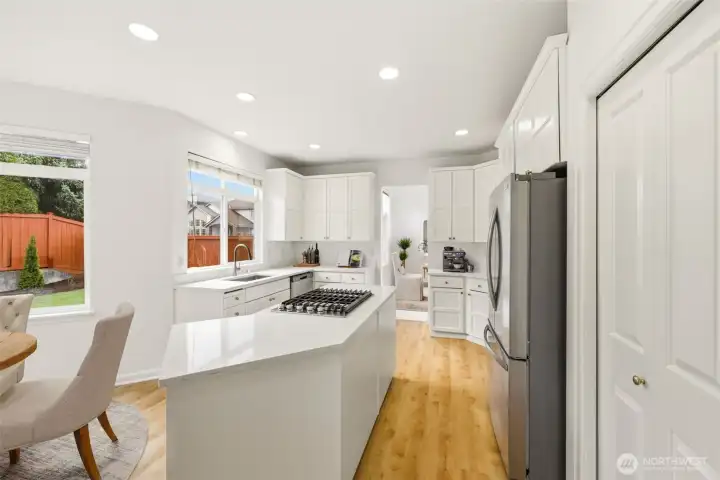 Open kitchen design overlooking main living areas Open kitchen design overlooking main living areas