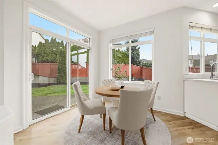 Sunny breakfast nook with views of the backyard