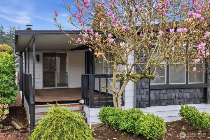 left side of home with with access to the front door