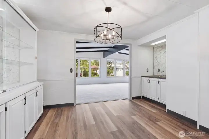 Dining room with wet bar and lots of built in storage