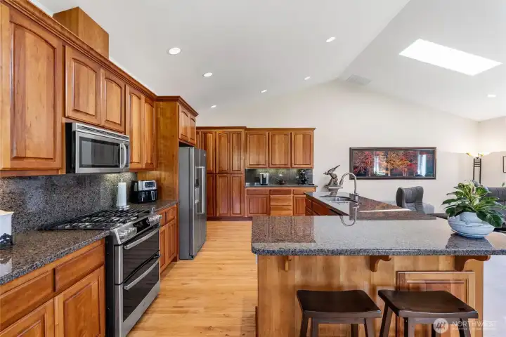 Gas Range, Pantry Cabinet with Pullouts, Coffee Bar Counter, and Plenty of Cabinets