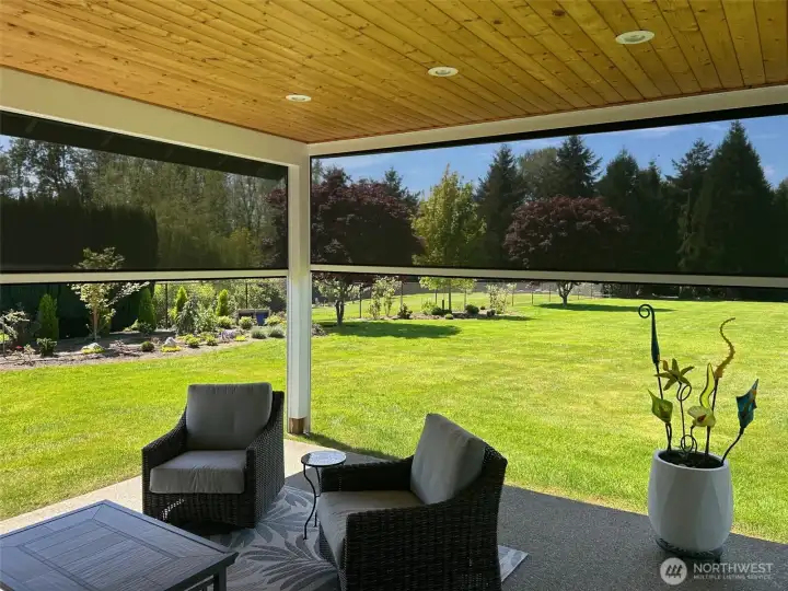 The Covered Patio with the Remote Shades Partially Lowered