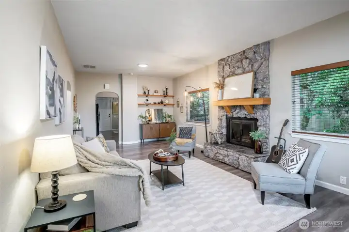Stunning living room envelopes the entry.