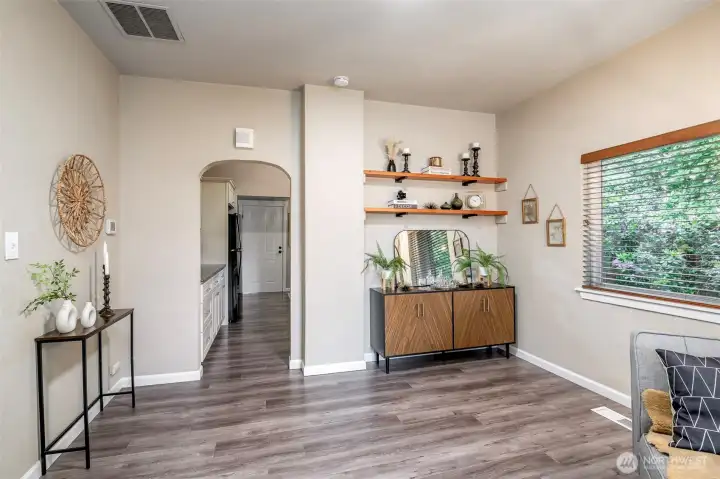 Arched doorways and an inset area for nesting additional furniture.