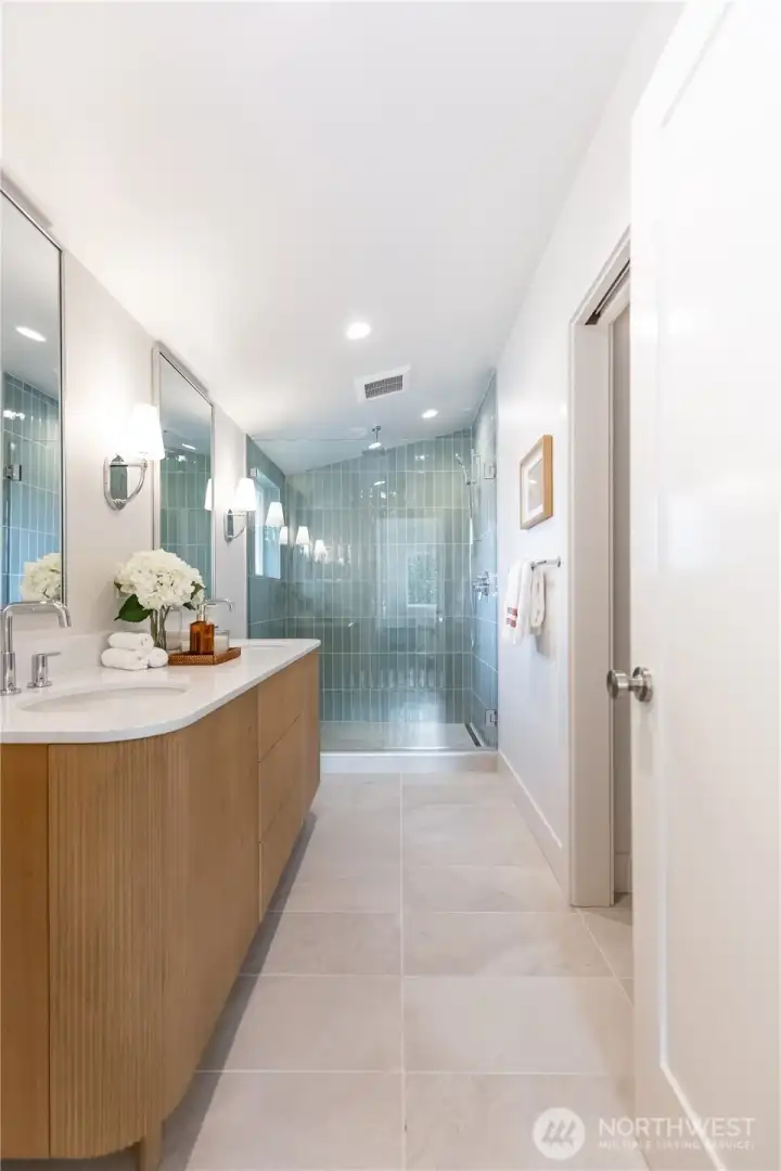 Primary bath with water closet entry to the right. Primary bath with water closet entry to the right.