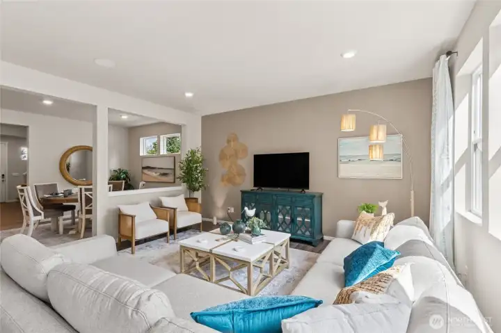 Extended laminate hardwood flooring throughout the main level living space. Pictures are for representation only colors and options will vary.