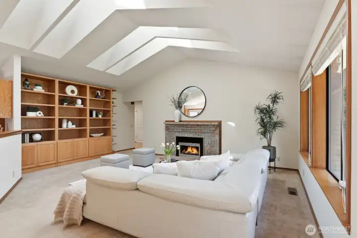 Great room with vaulted ceilings and lots of natural light and gas fireplace
