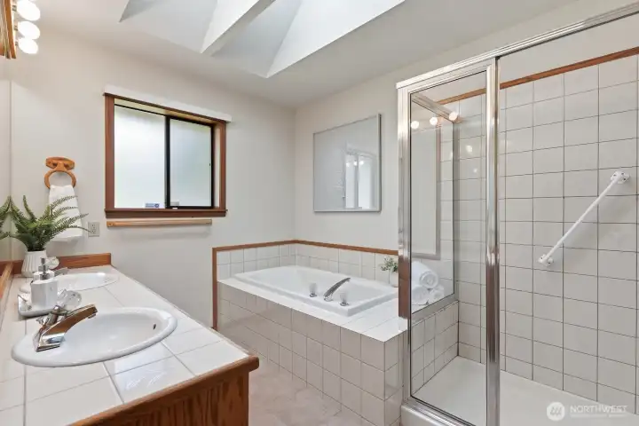 Primary five piece bathroom with heated floors