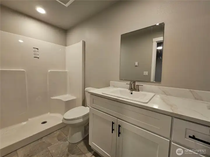 Example of Primary Bath with Full Size Step-in Shower from previous listing
