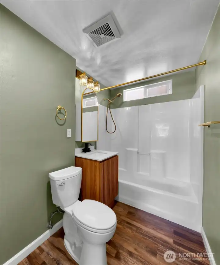 Full guest bath located off the main living area