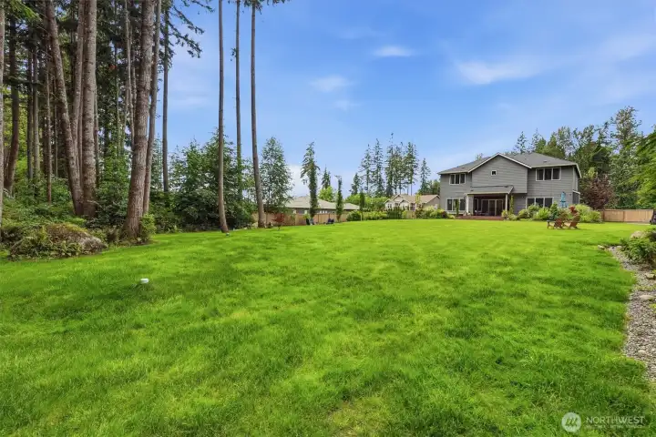 This tree lined lot is ideal for privacy, but you still have all the space to enjoy the stunning 1 acre lot. This tree lined lot is ideal for privacy, but you still have all the space to enjoy the stunning 1 acre lot.