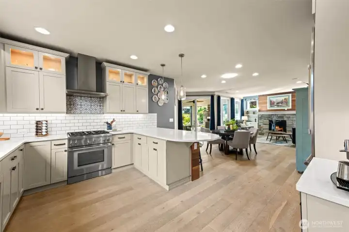 open concept layout with wide plank LVP floors